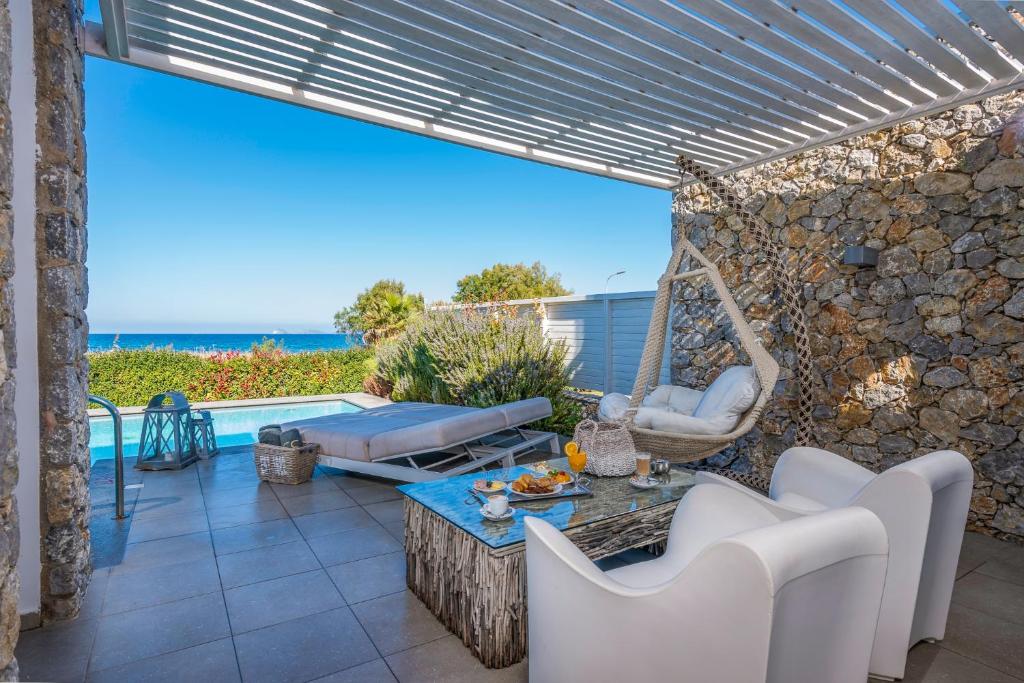Hôtel Diamond Deluxe - Adults Only-  hébergement vue sur la mer Égée avec piscine privée