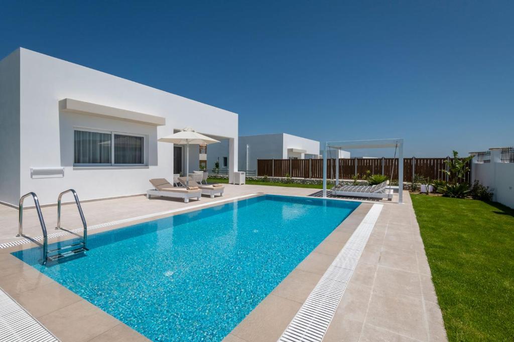 Hôtel Gaia Palace 5 étoiles et sa villa avec piscine privative à Mastichari en Grèce